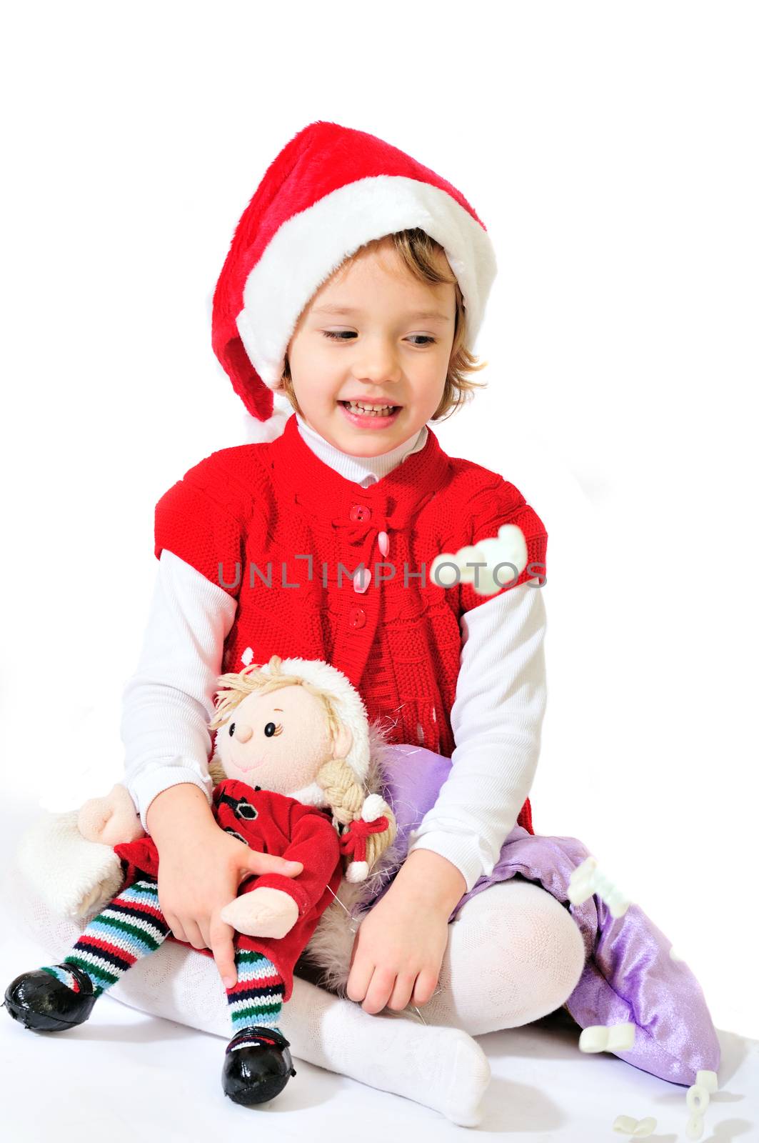 happy playing santa girl sitting and smiling