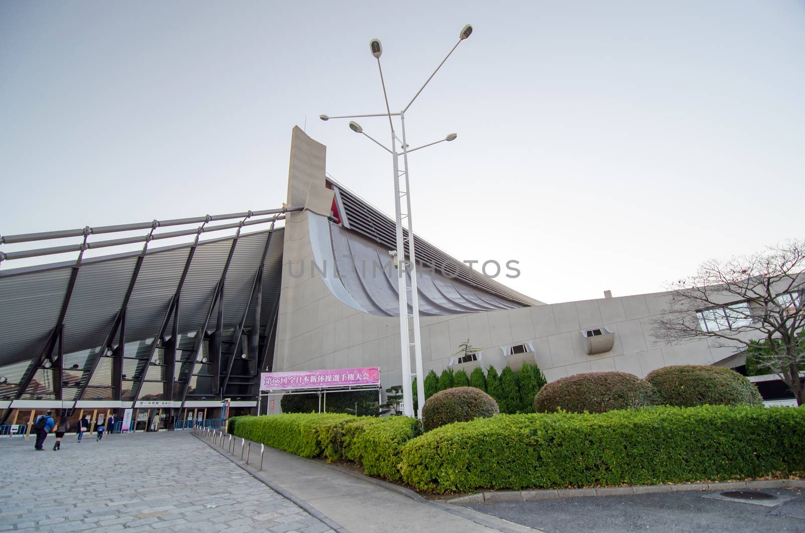 Tokyo, Japan - November 20, 2013: People visit Yoyogi National Gymnasium by siraanamwong