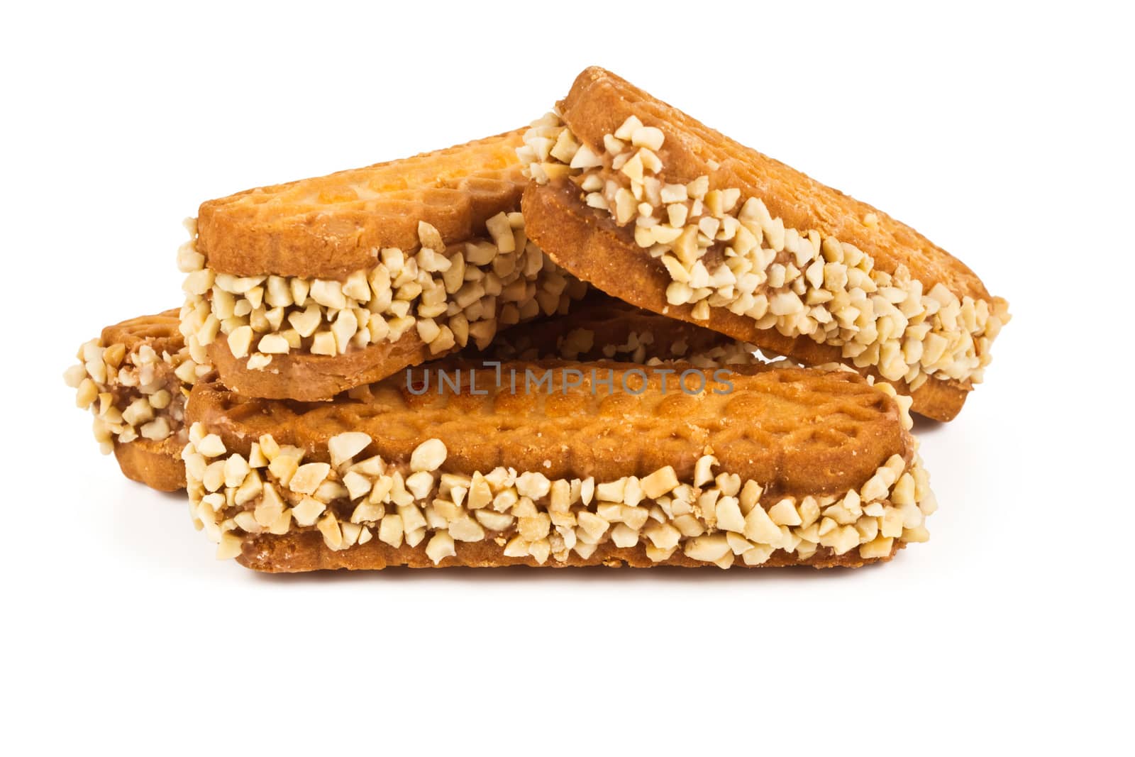 Elongated oval cookies with peanut crumbs isolated on white background