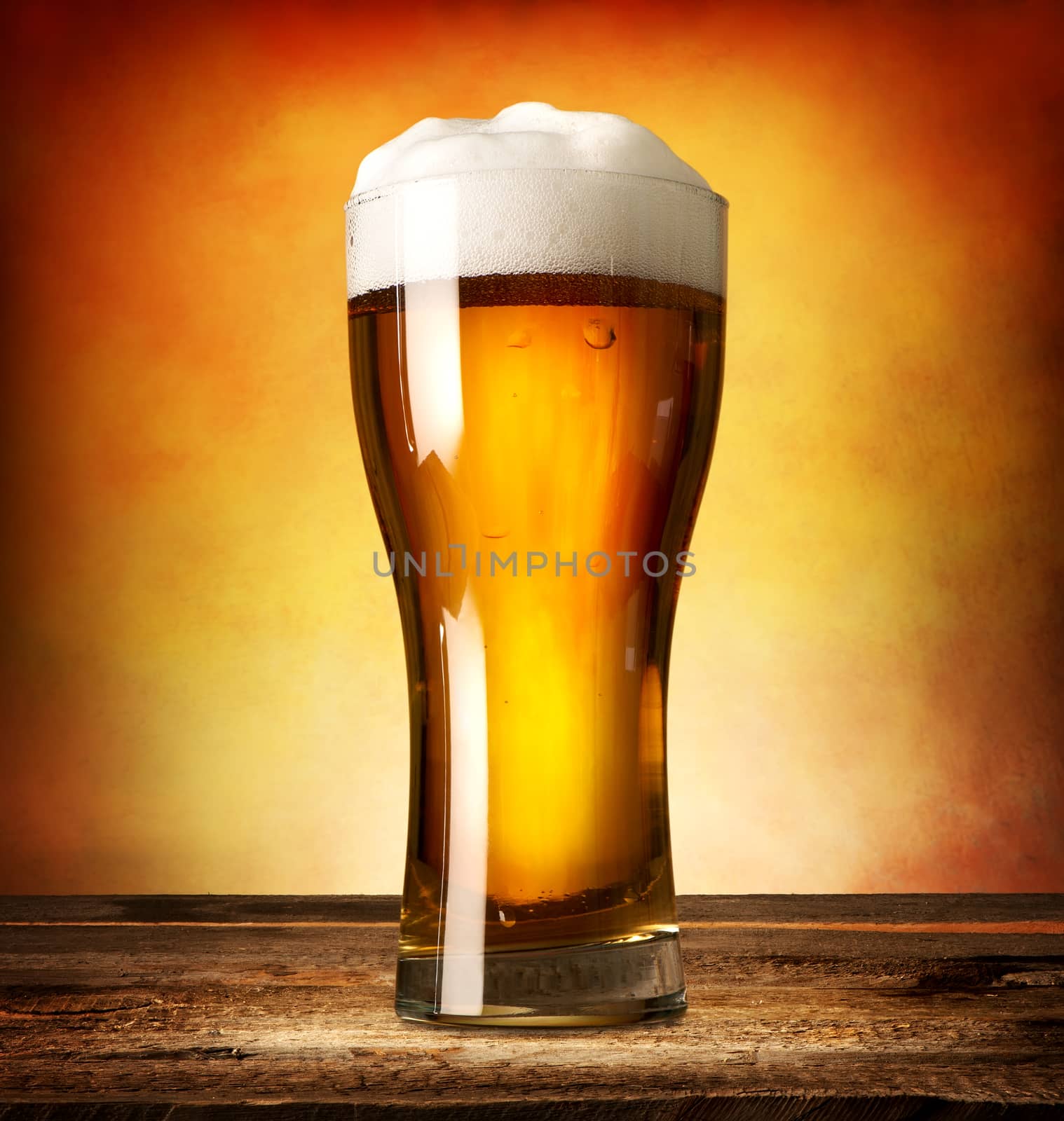 Glass of lager by Givaga