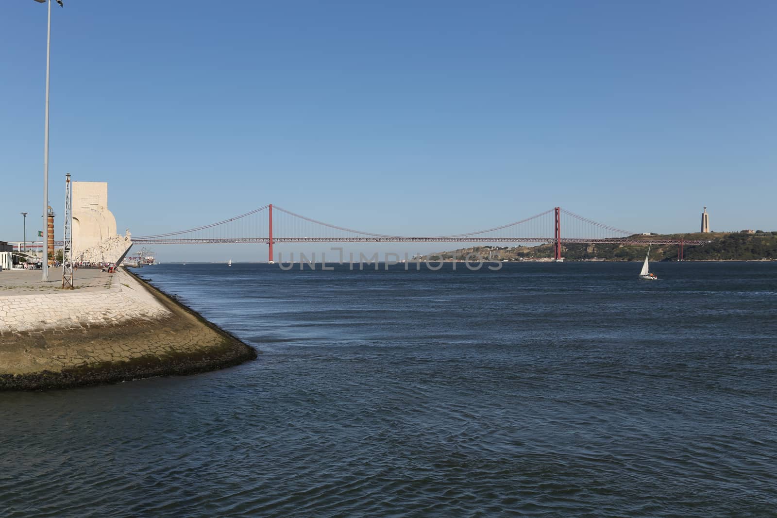 Monument to the Discoveries (Padrao dos Descobrimentos) and The 25 de Abril Bridge, Lisbon, Portugal