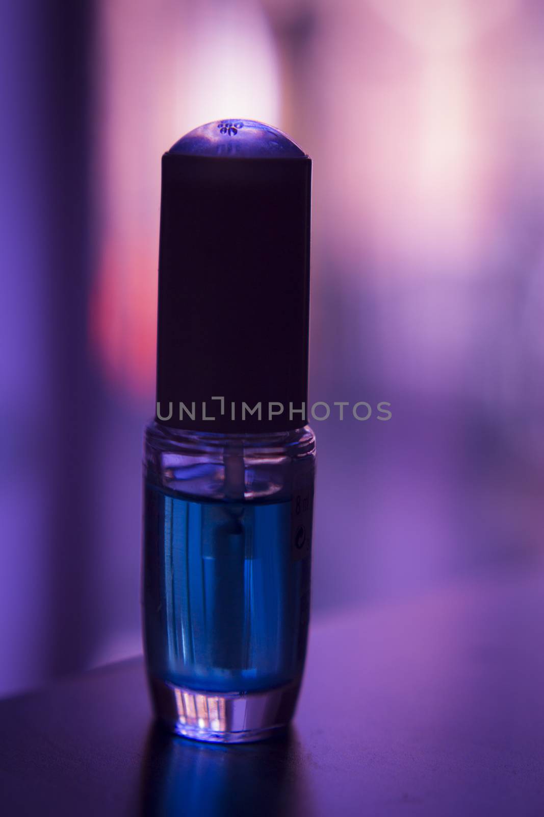 Bottle of transparent nail polish