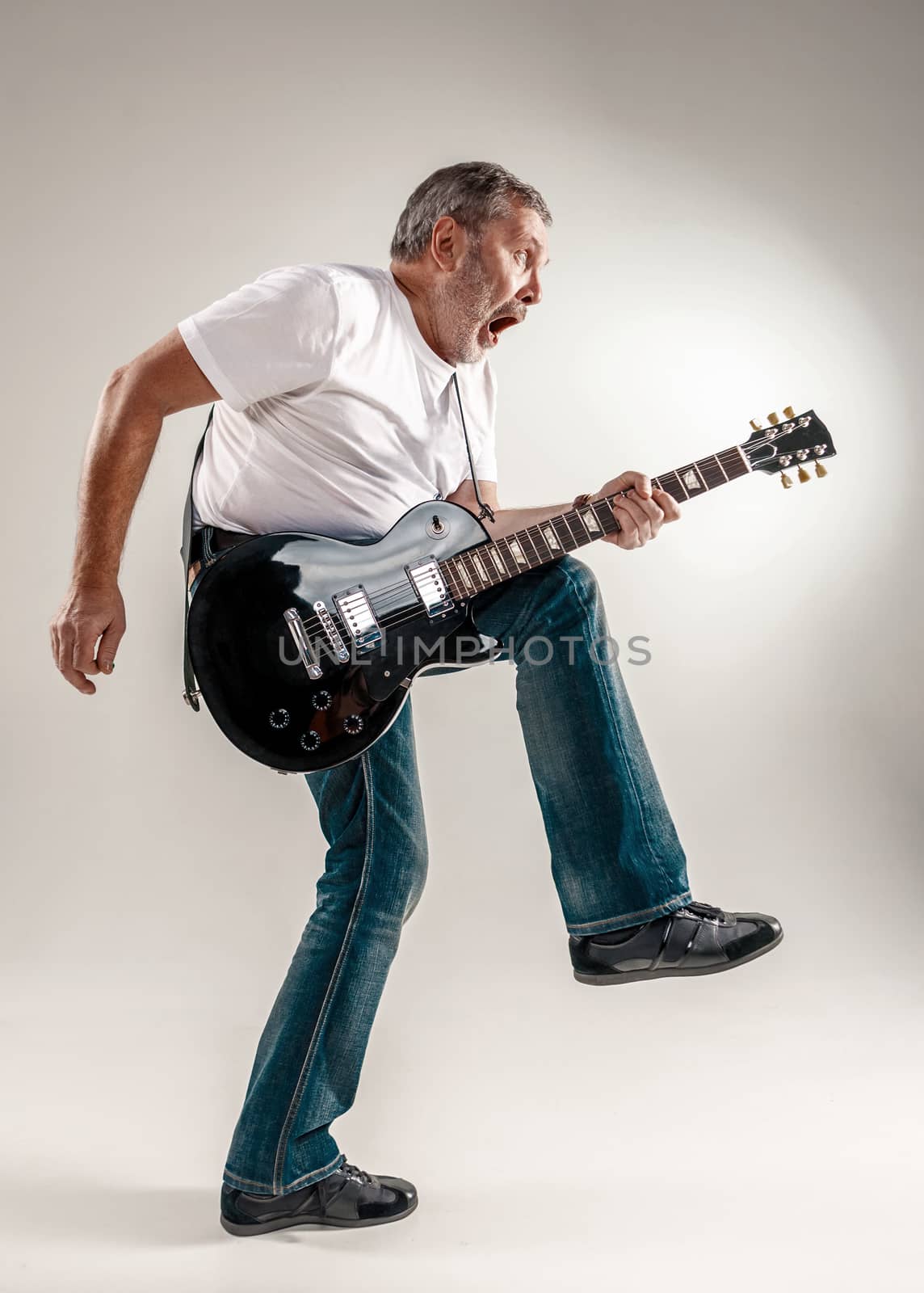 Full length portrait of a guitar player  by master1305