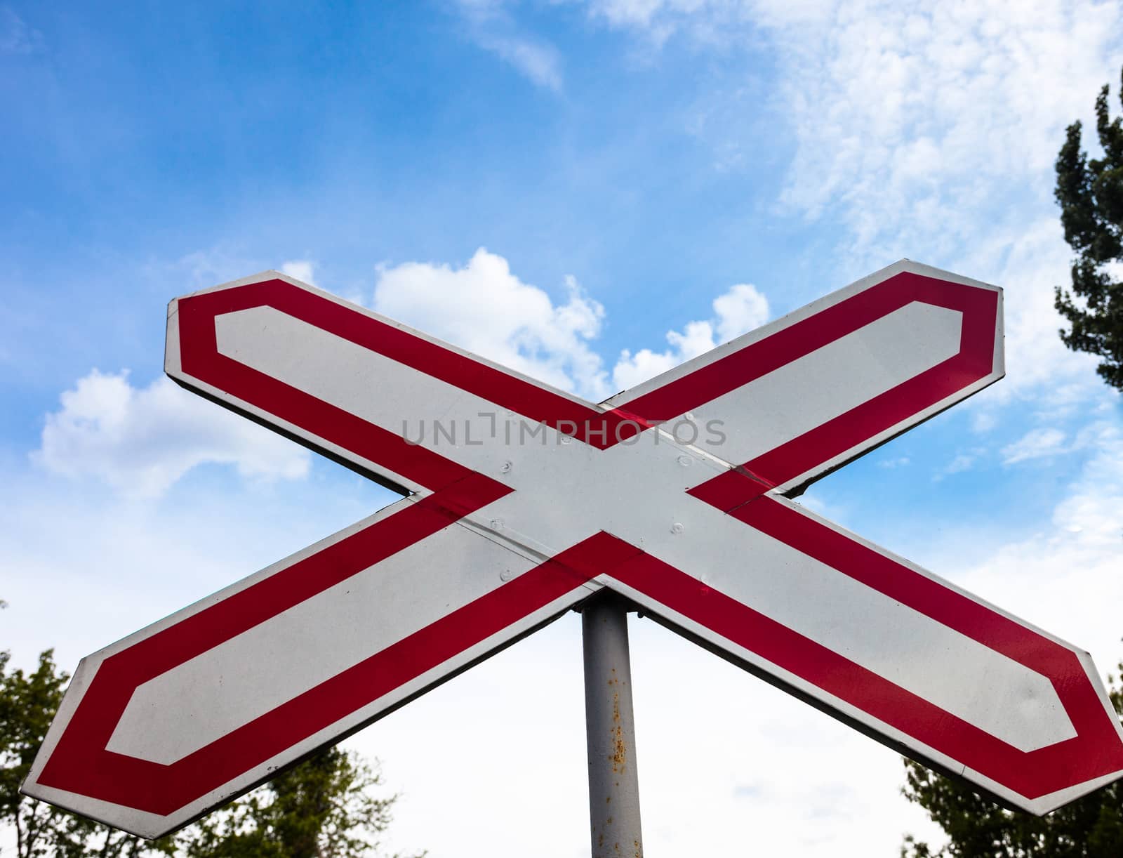 Single track railway crossing sign in Ukraine. Close up.
