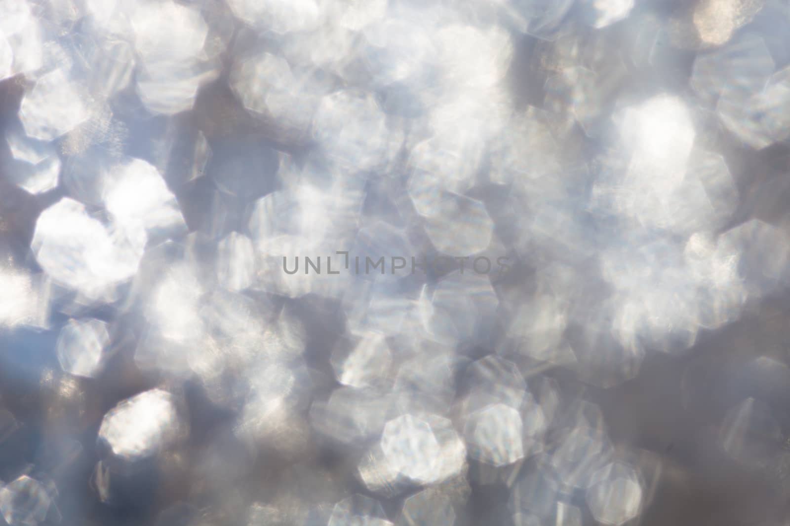 Blurred surface of the polythene in the sunshine.
