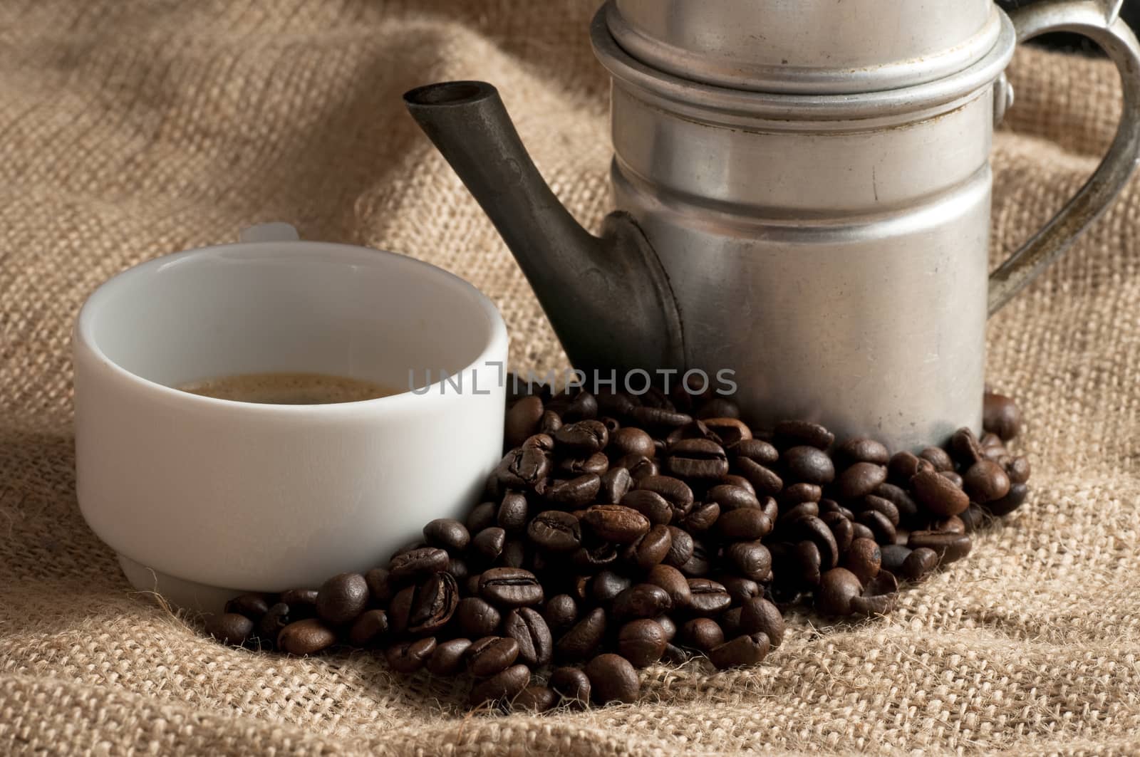 cup of coffee made with old Neapolitan coffee and served on canvas jute