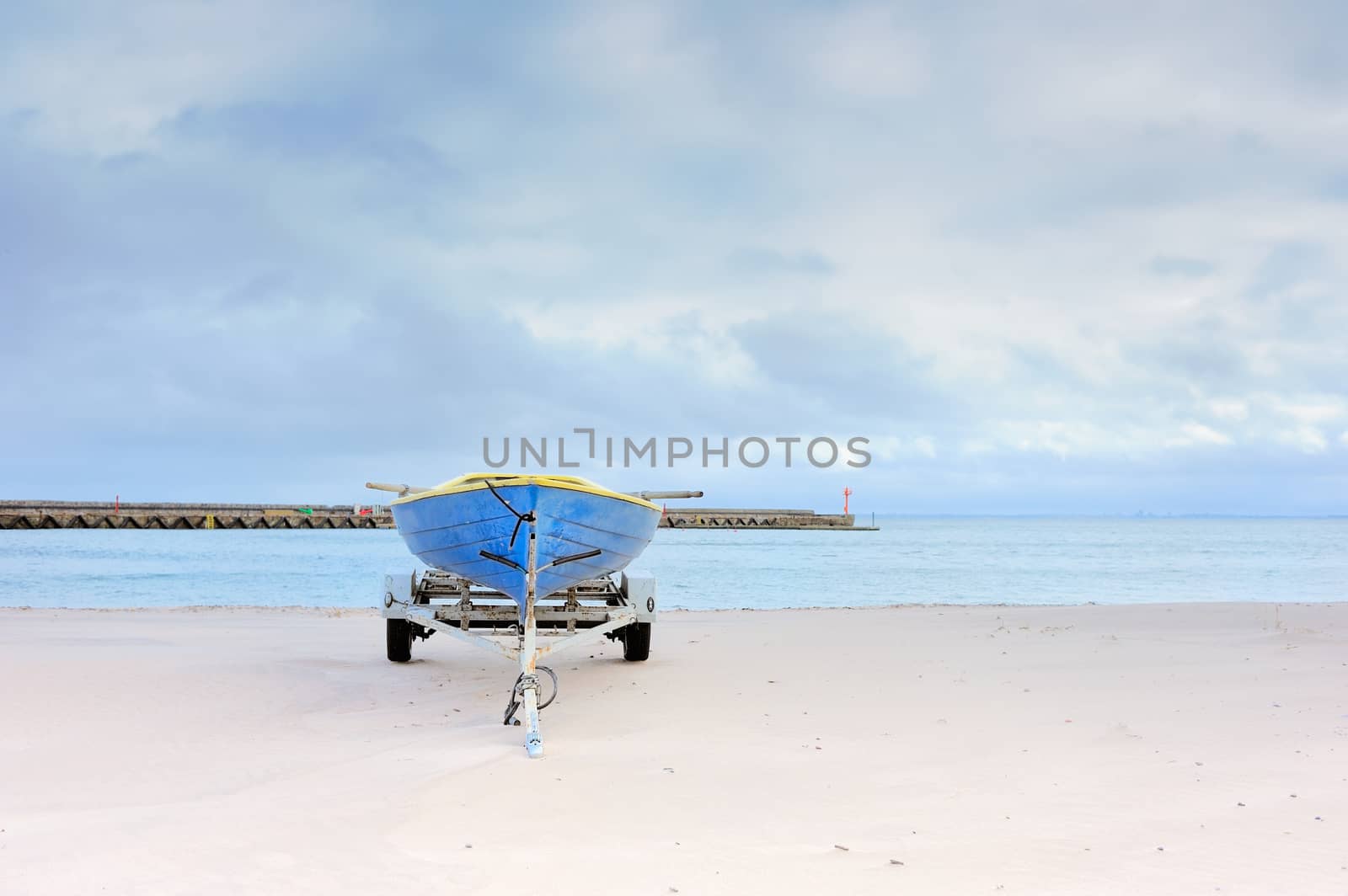 Old boat on the sandy beach