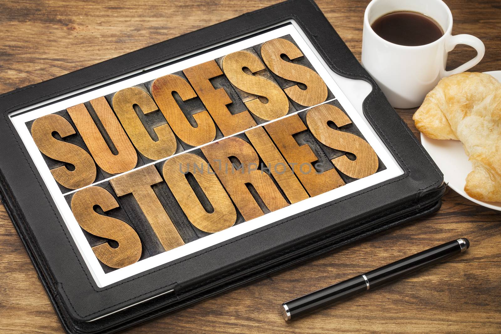 success stories on digital tablet by PixelsAway