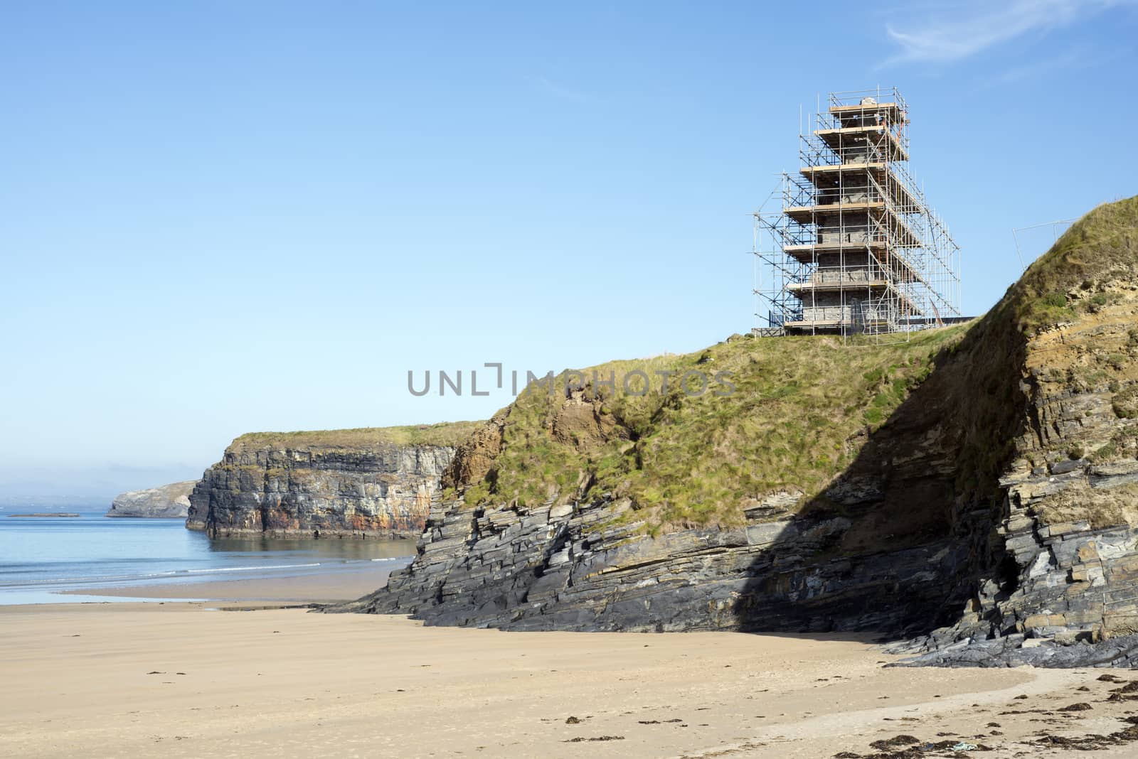 ballybunion castle scafolded on the cliffs by morrbyte