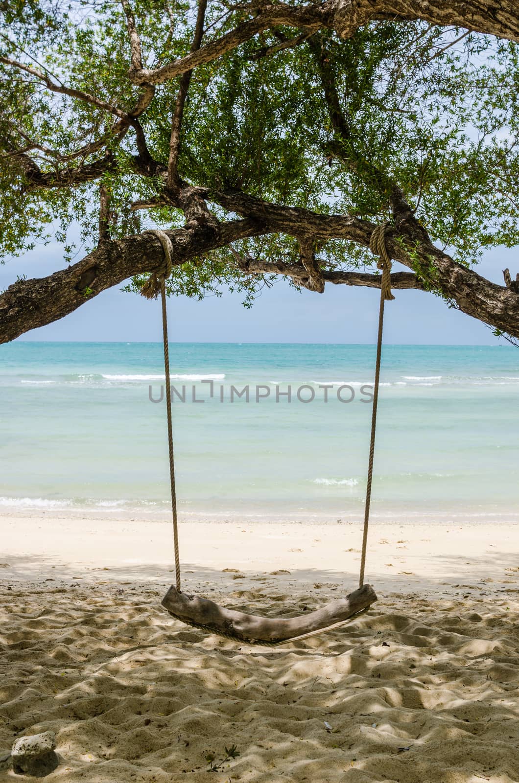 swing on beach by sweetcrisis