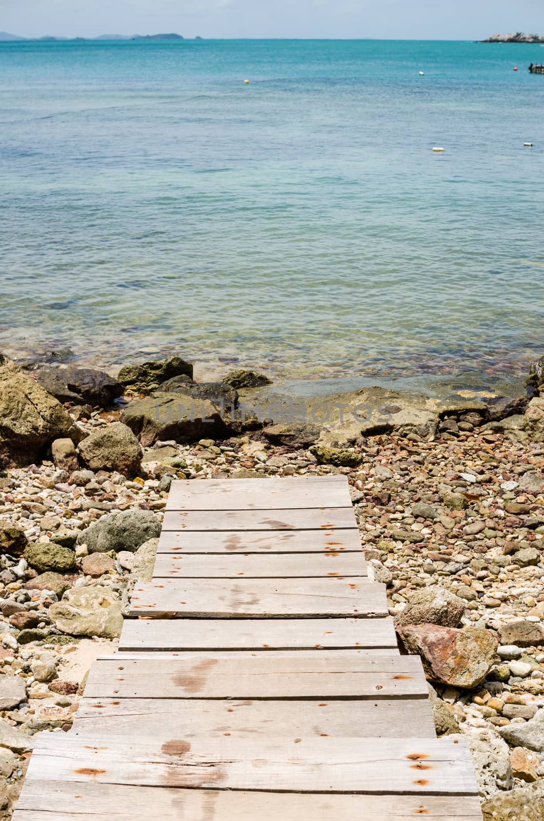 dock rock and blue sea in Thailand