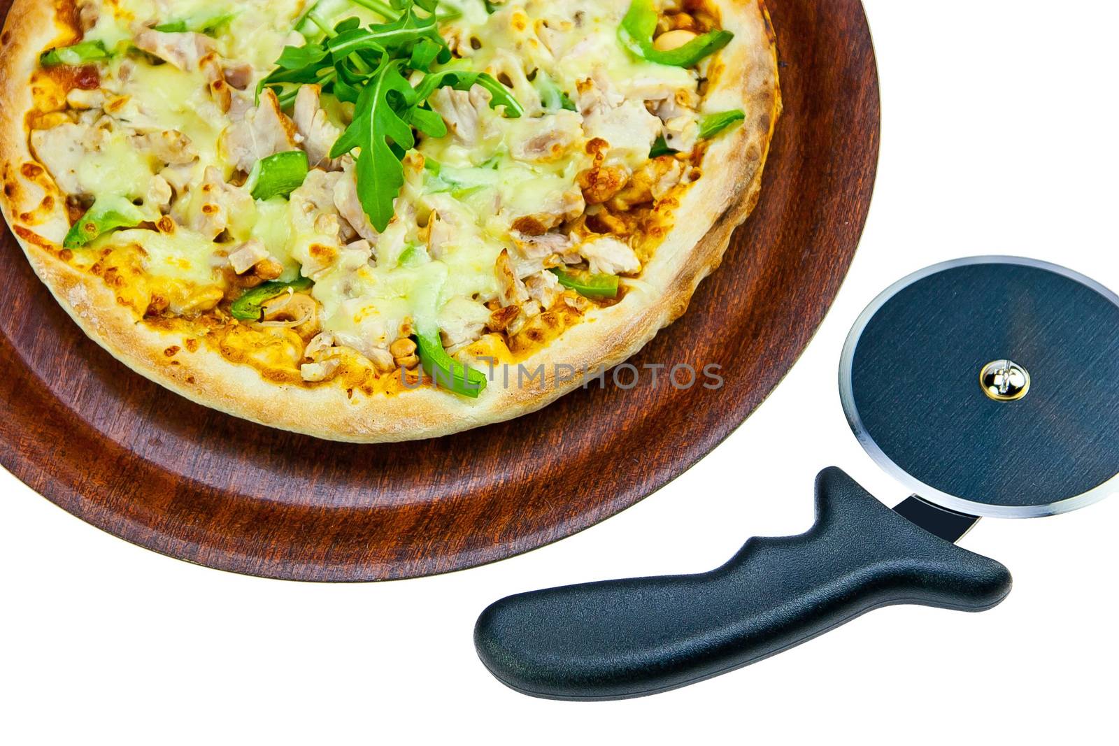 Chicken Pasta on Tray and Pizza Cutter on white by jaaske