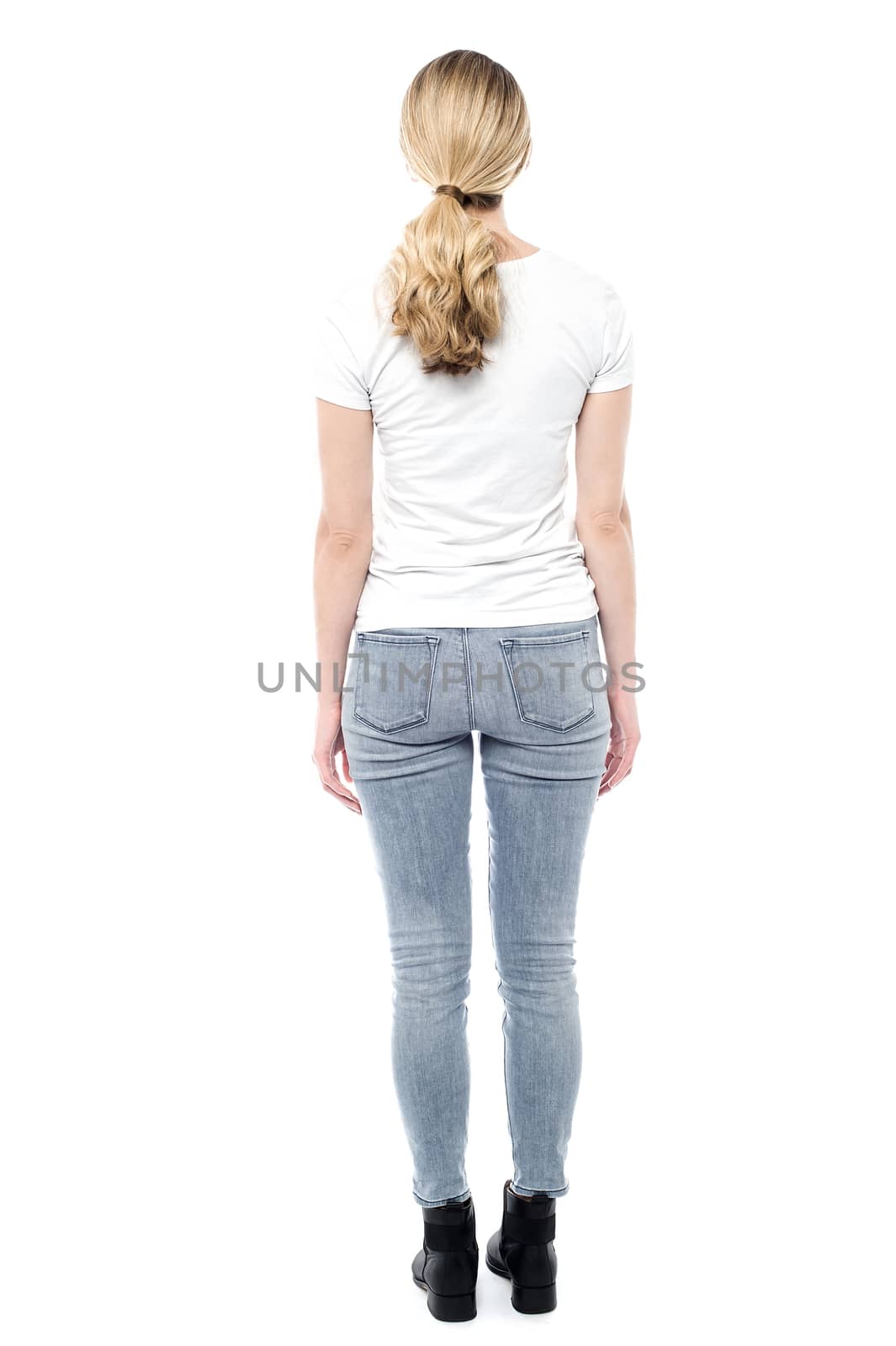Girl in trendy casuals from behind