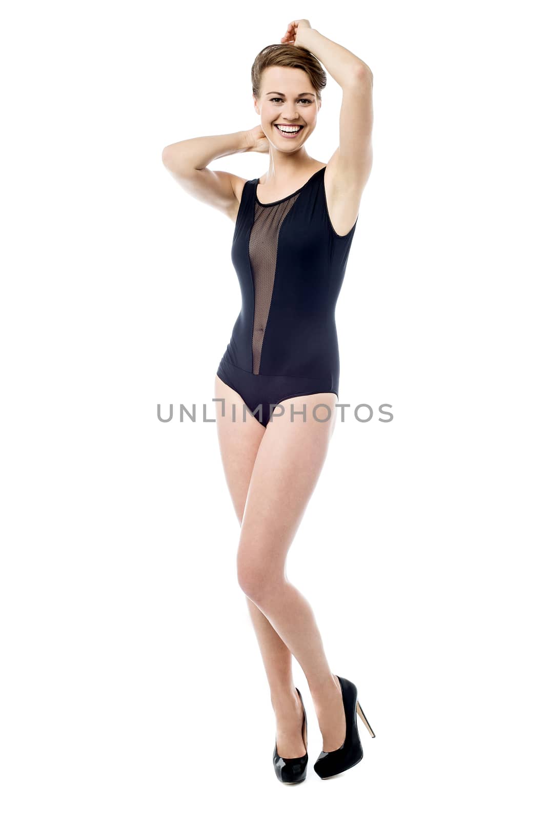 Attractive woman posing in sensual swimsuit