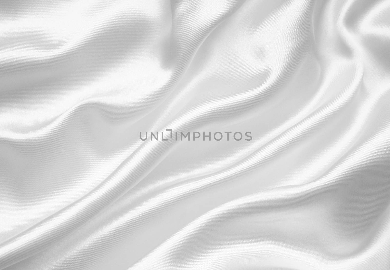 Smooth elegant white silk or satin can use as wedding background 