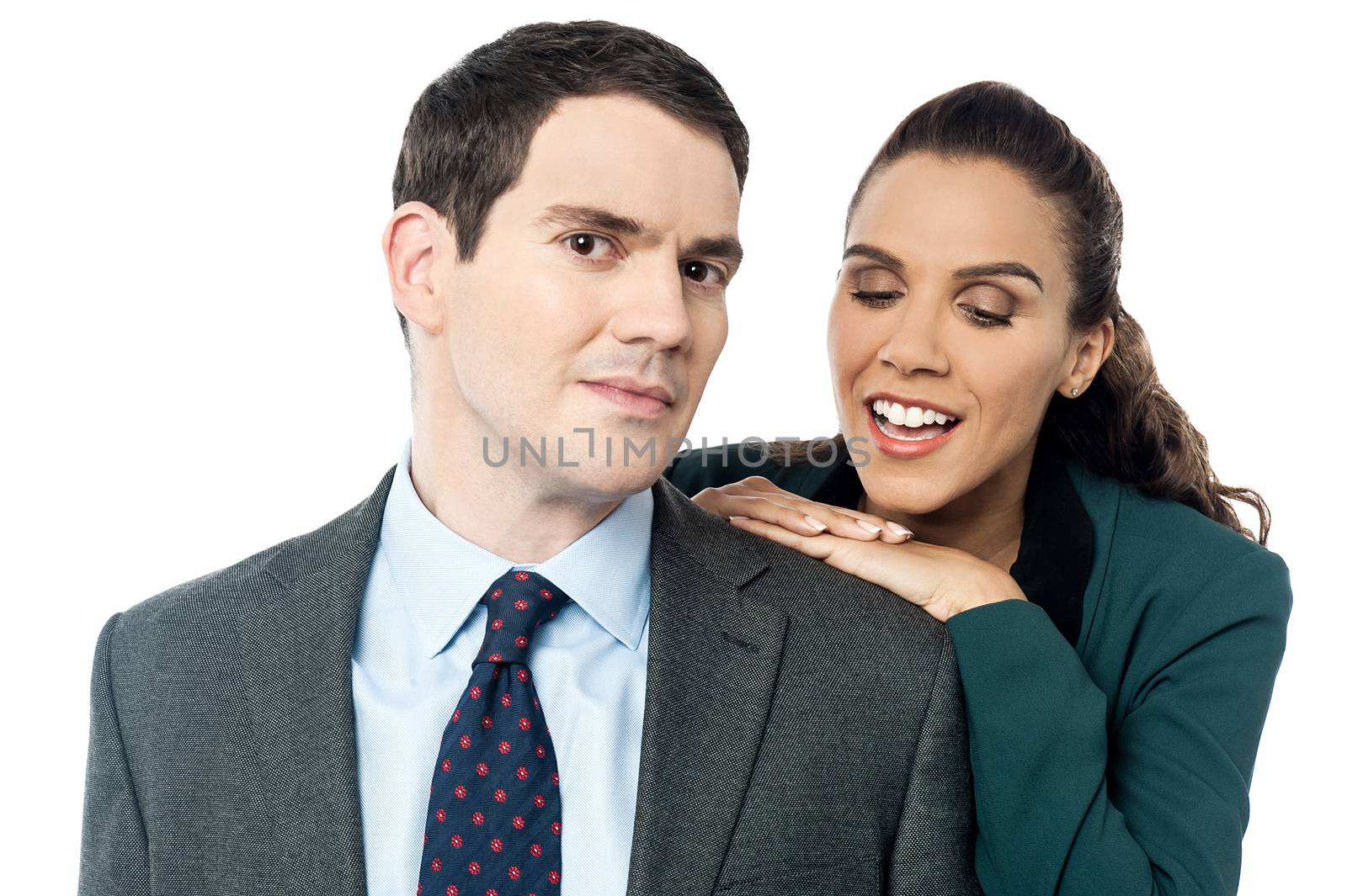 Attractive business couple posing together by stockyimages