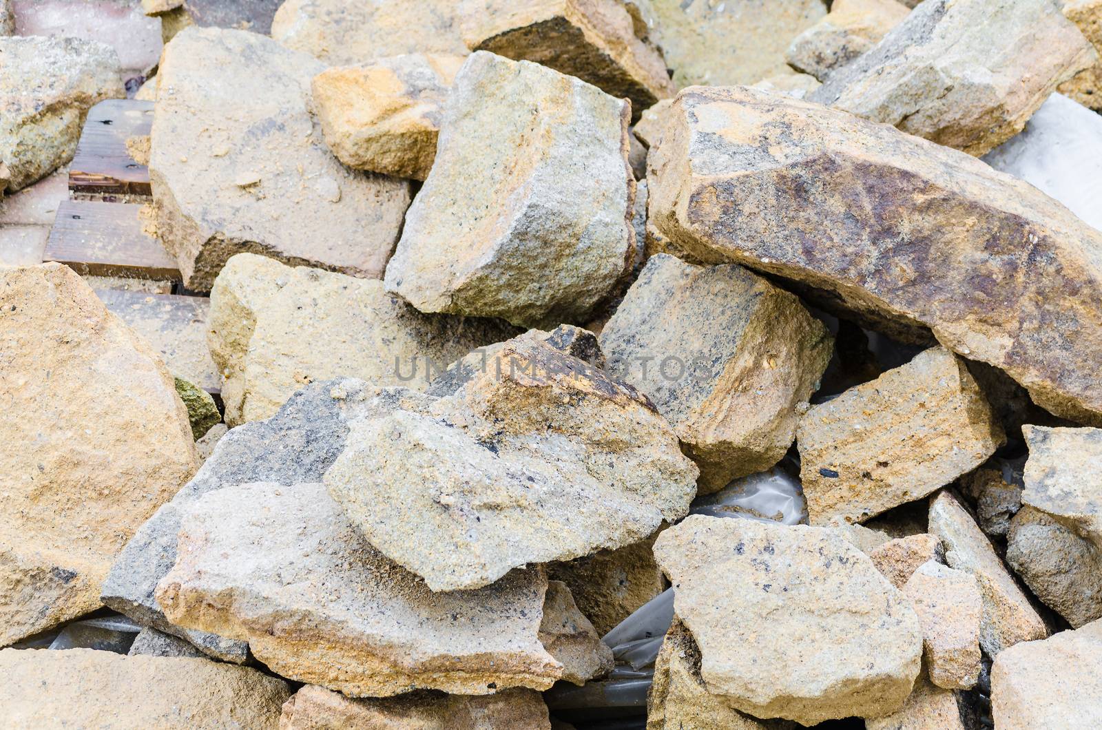 Sandstone from a quarry. to build a stone wall.