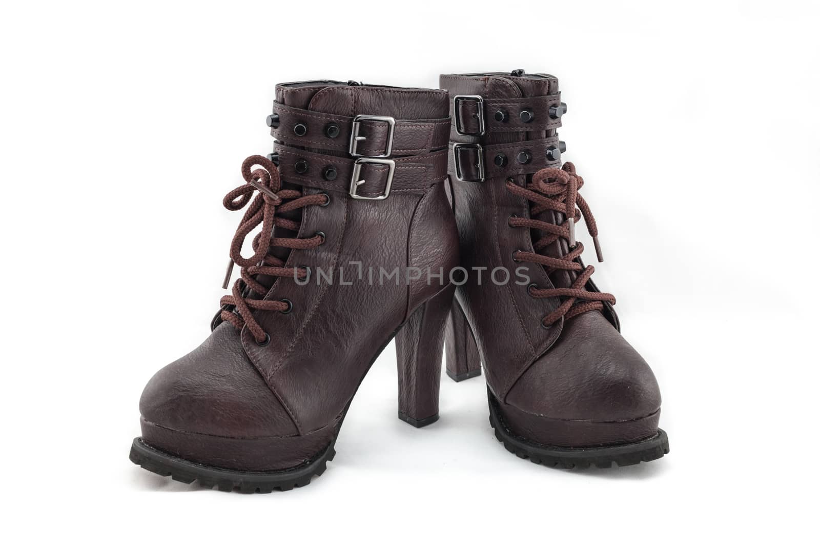lady leather boot bown with shoelace on white background.