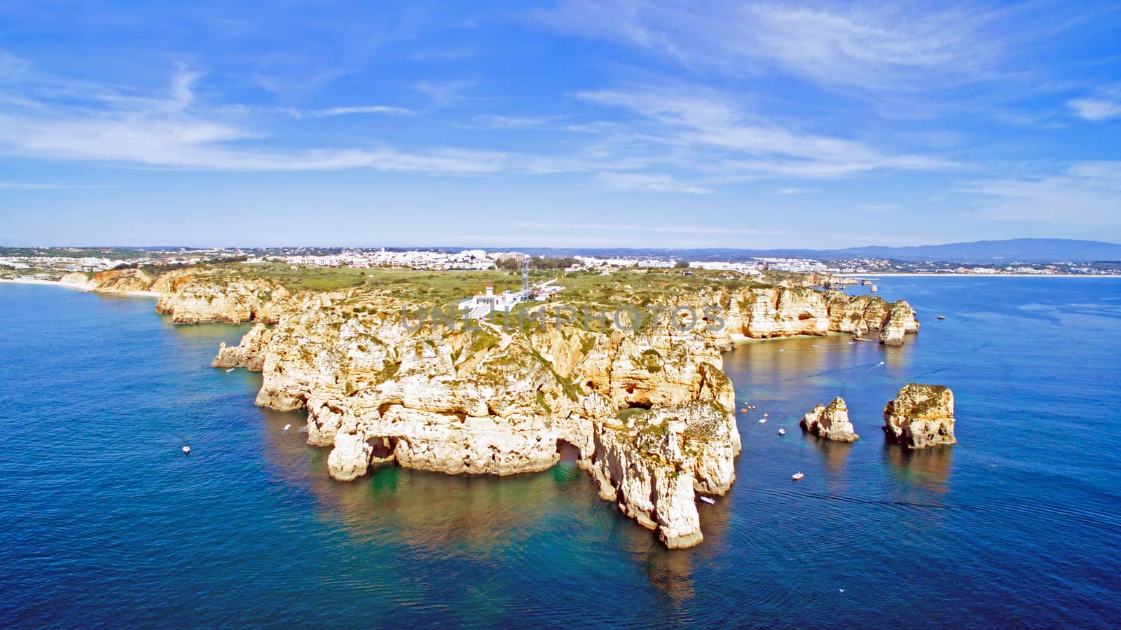 Aerial from Ponta Piedade with the lighthouse in Lagos Portugal