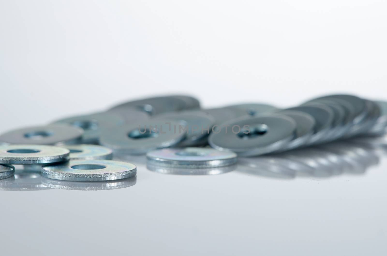 Lot of screw washers isolated on white background.