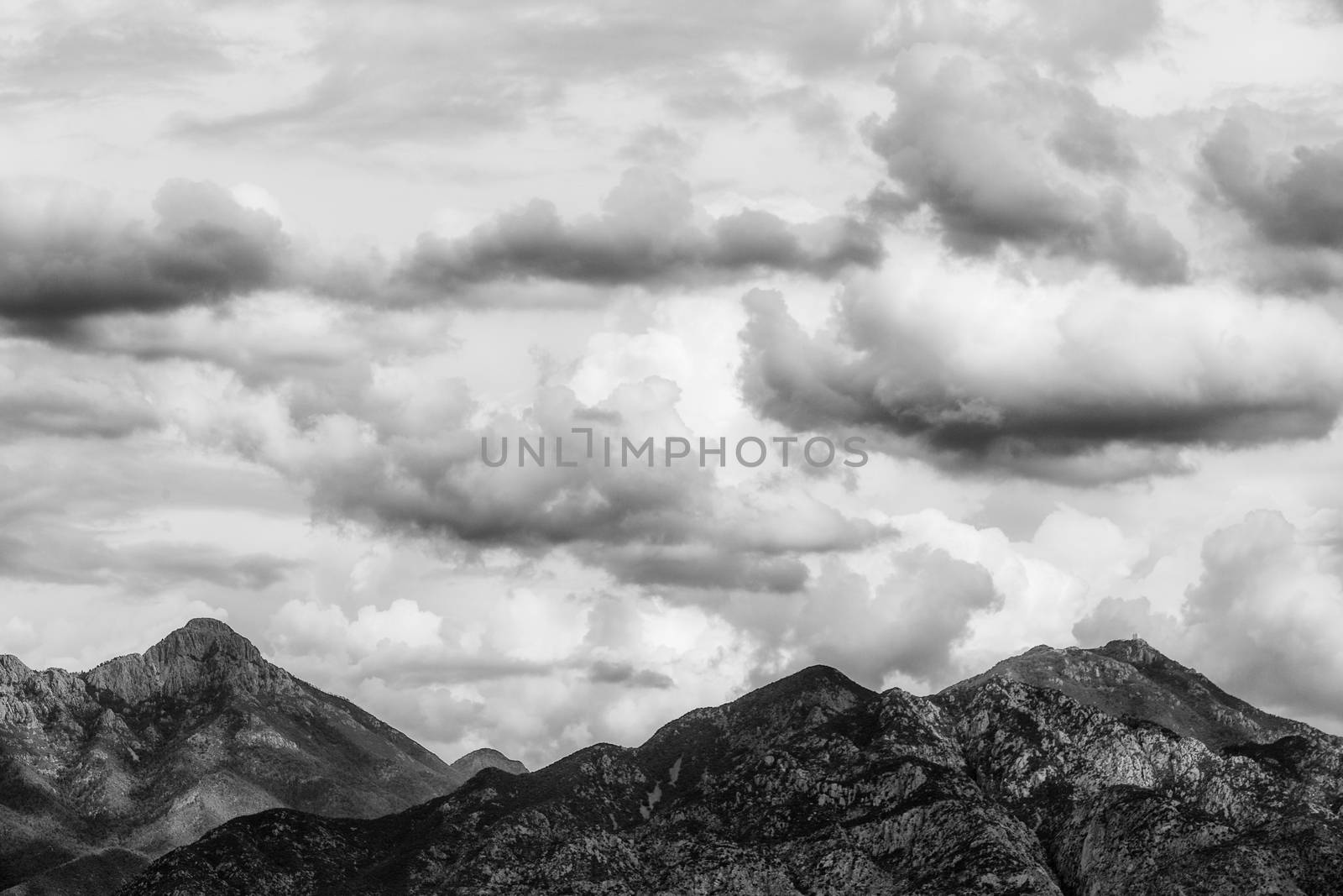 Thunderstorm clouds hanging over mountains in Arizona