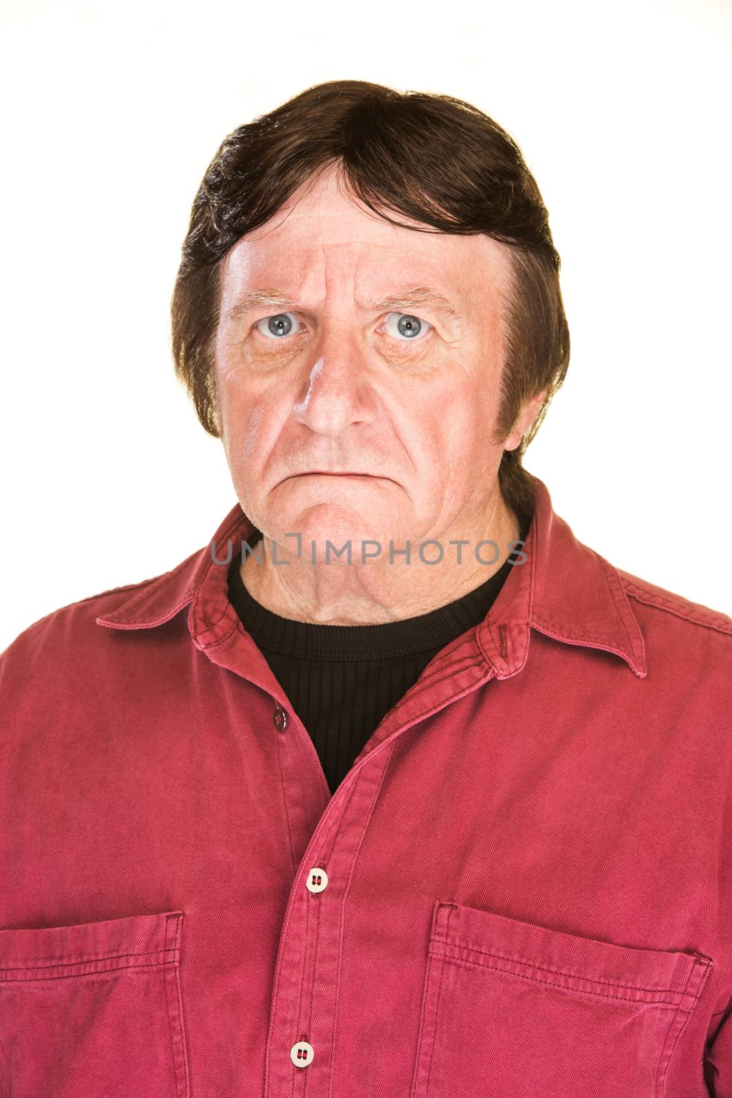 Suspicious middle aged male over white background