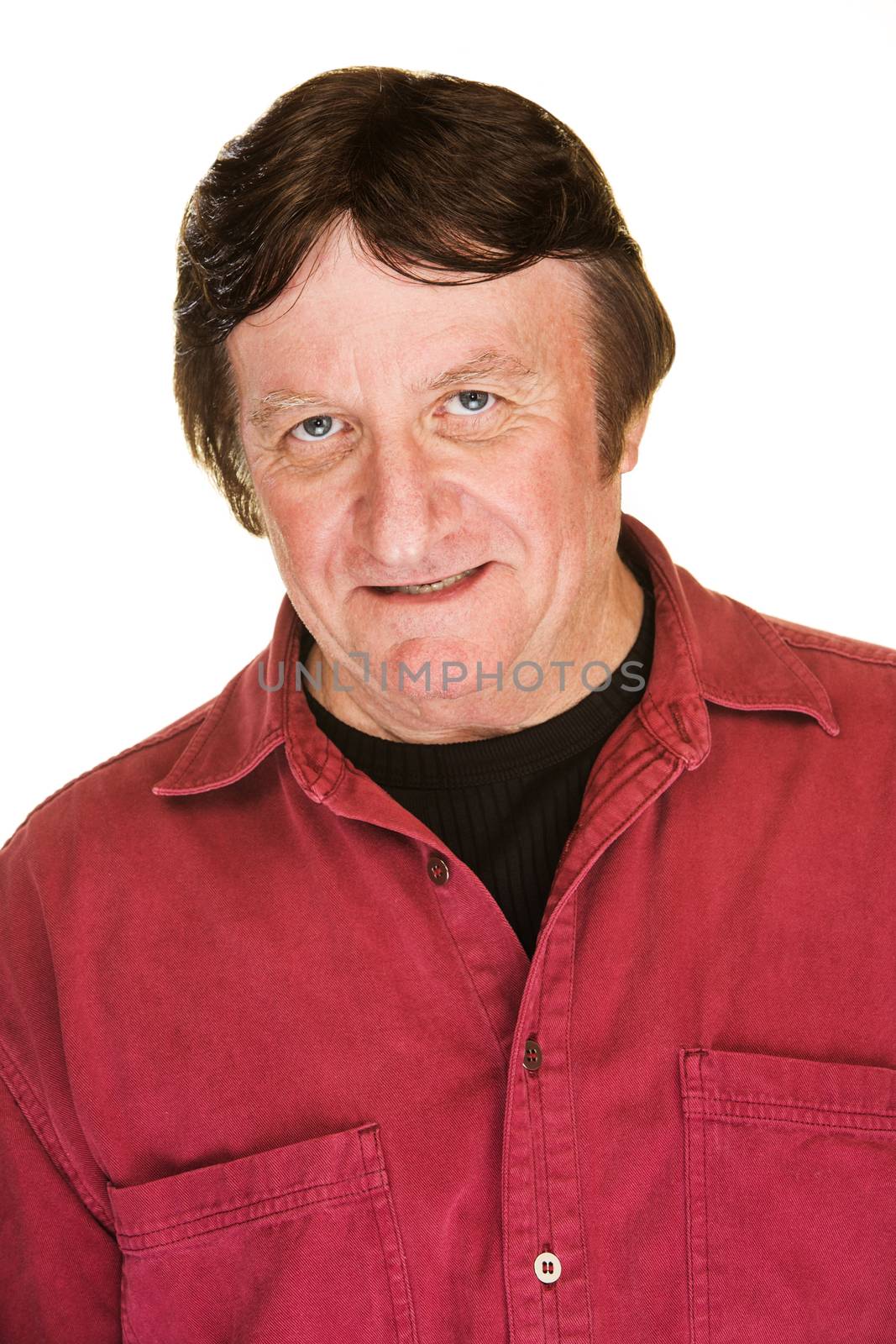 Middle aged flirtacious man in red grinning