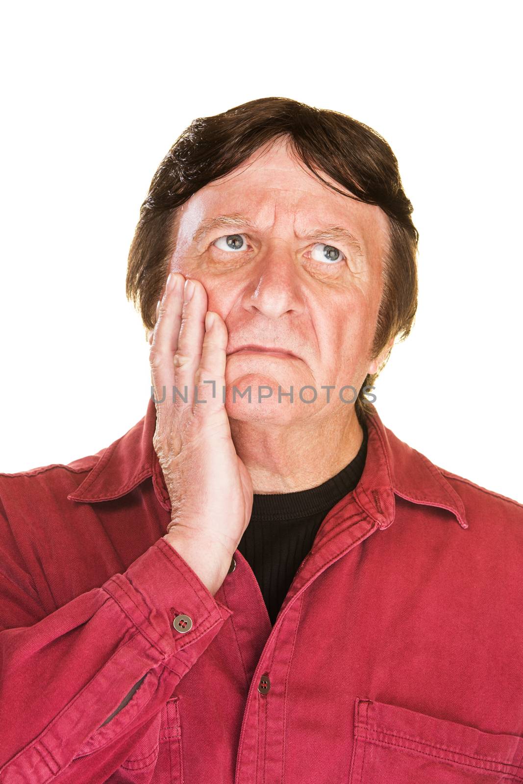 Single isolated lost man with hand on cheek