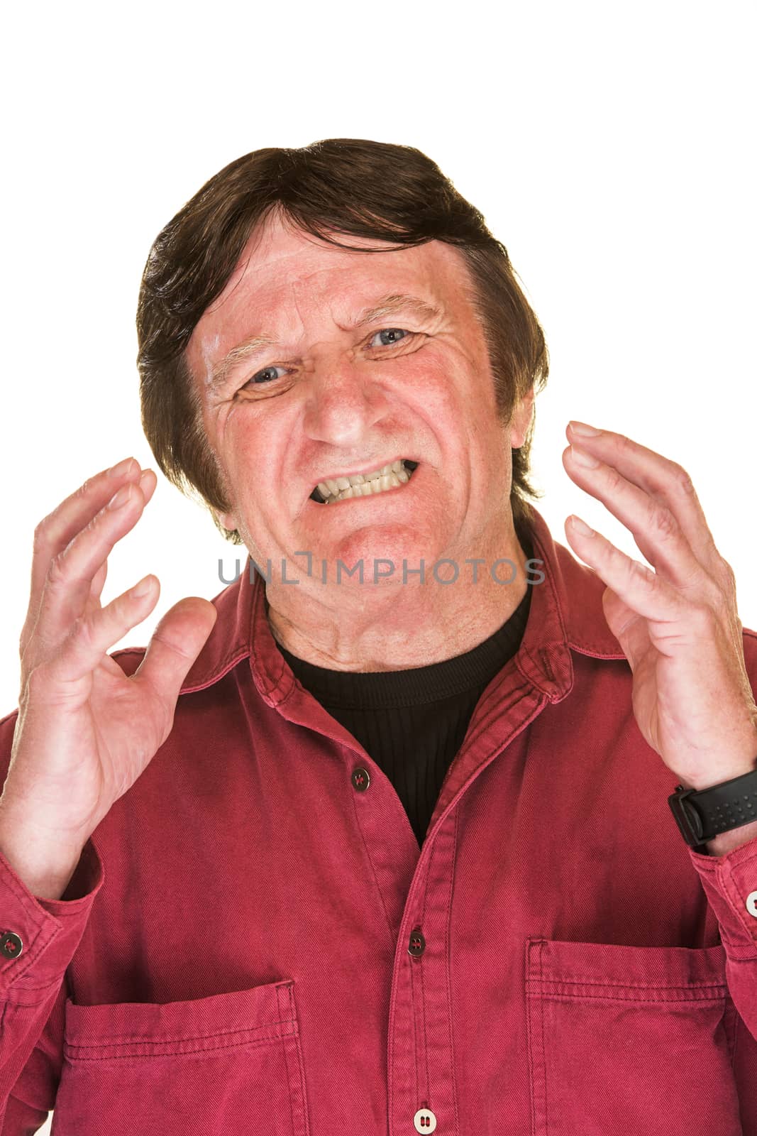 Single annoyed man in red with hands up