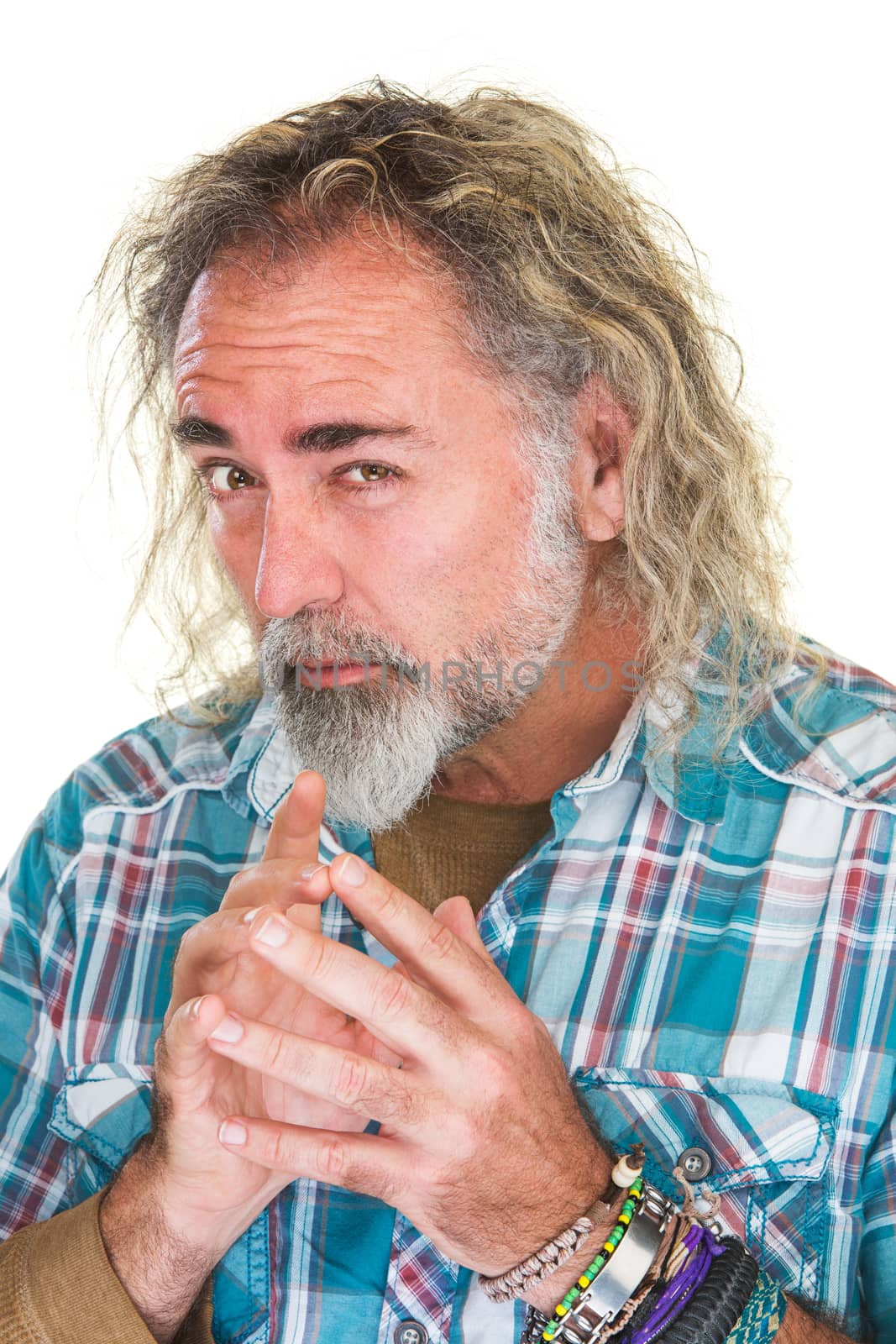 Single isolated male with devious expression over white background