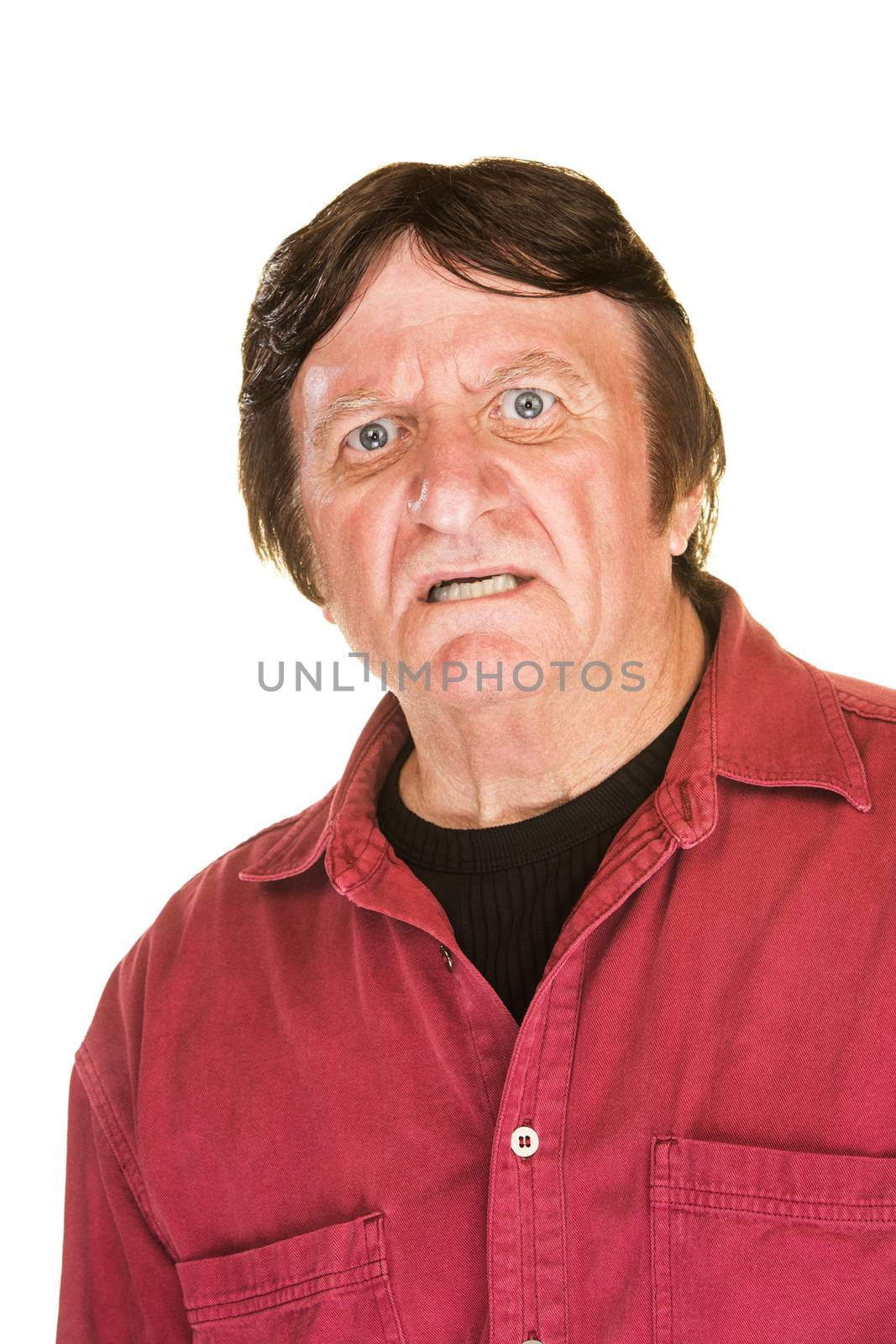 Middle aged man with terrified expression over white