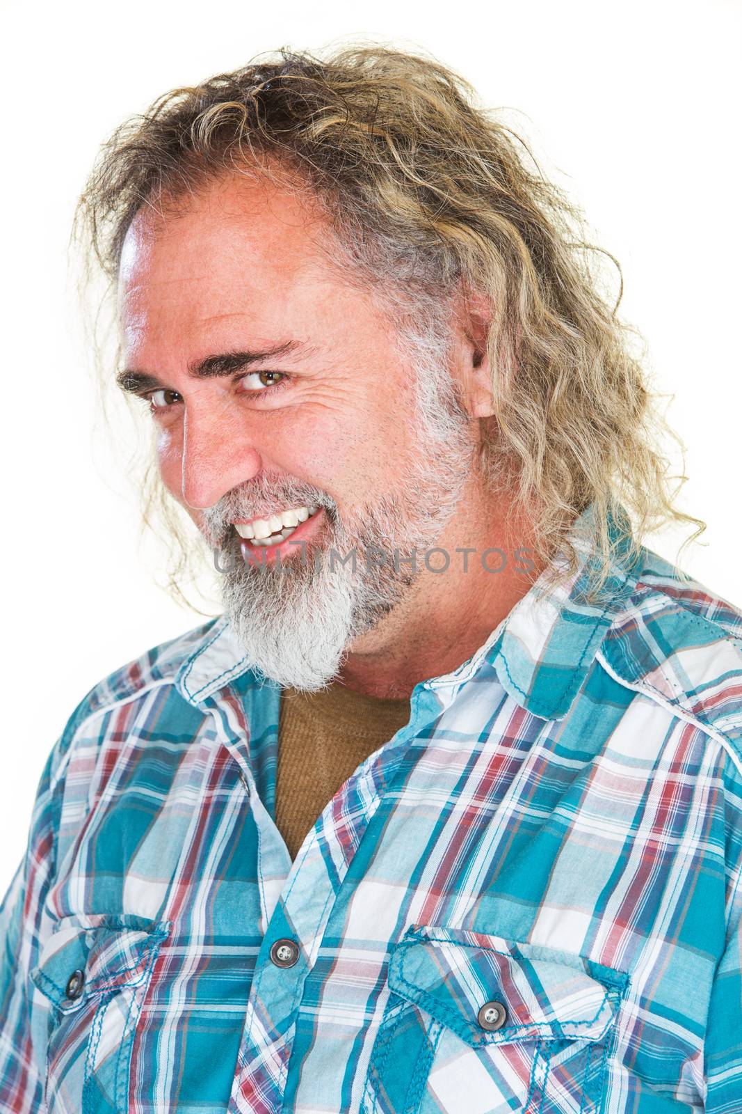 Flirtacious man with big smile and long hair