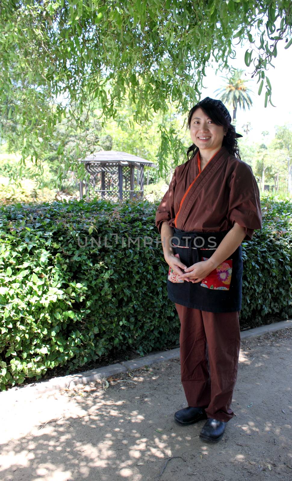 Portrait of a Japanese woman with traditional clothing.