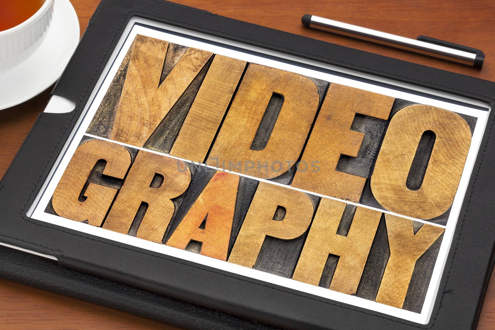 videography word abstract in wood type by PixelsAway