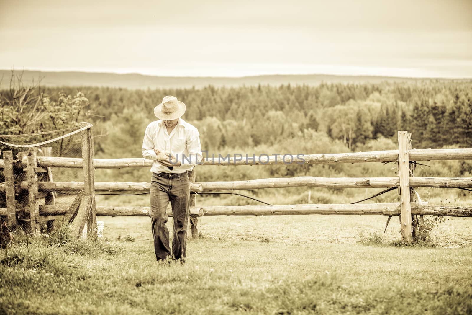 Young Farmer and a Chicken by aetb