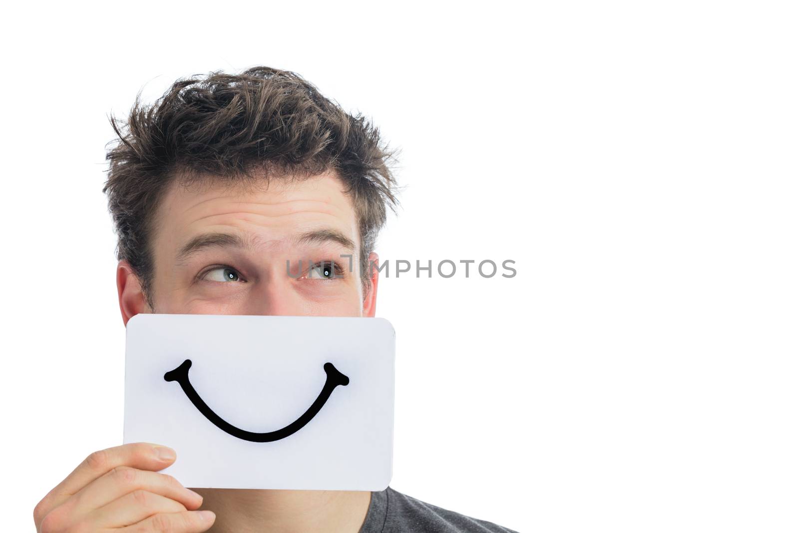 Happy Portrait of a Man Holding a Smiling Mood Board Isolated on White Background