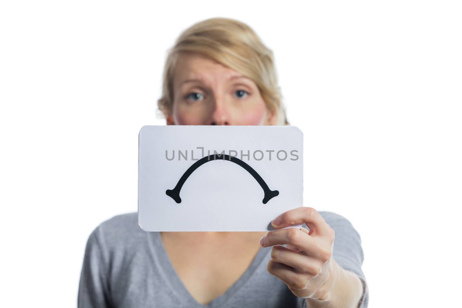 Unhappy Portrait of a Woman Holding a Sad Mood Board Isolated on white Background