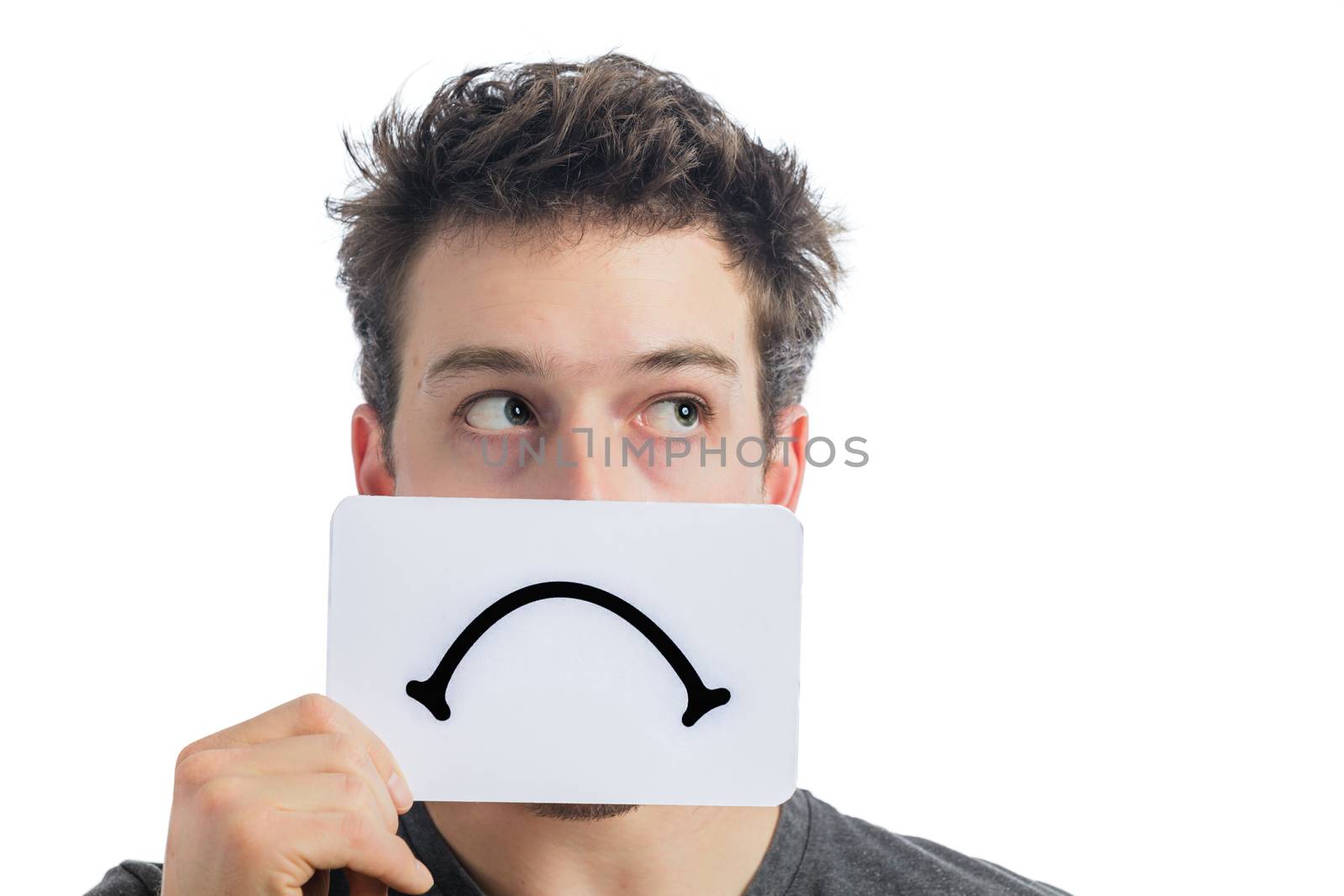 Unhappy Portrait of a Man Holding a Sad Mood Board Isolated on White Background