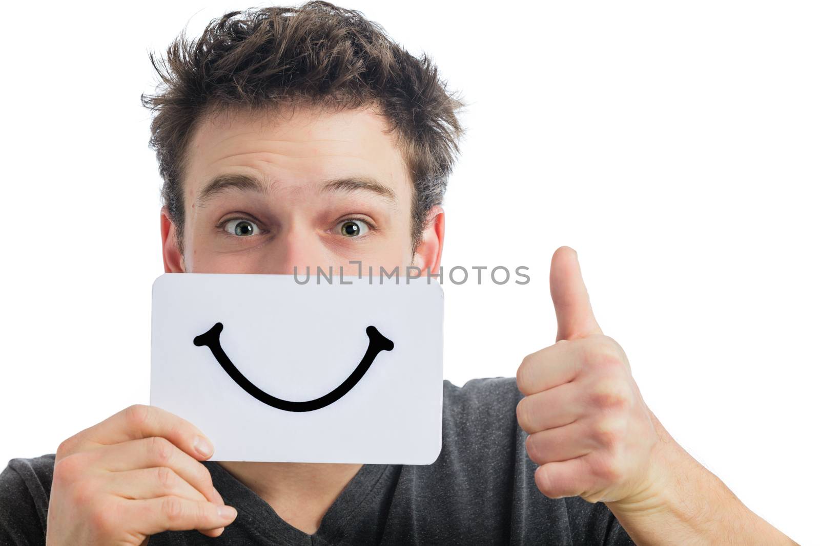 Happy Portrait of a Man Holding a Smiling Mood Board Isolated on White Background