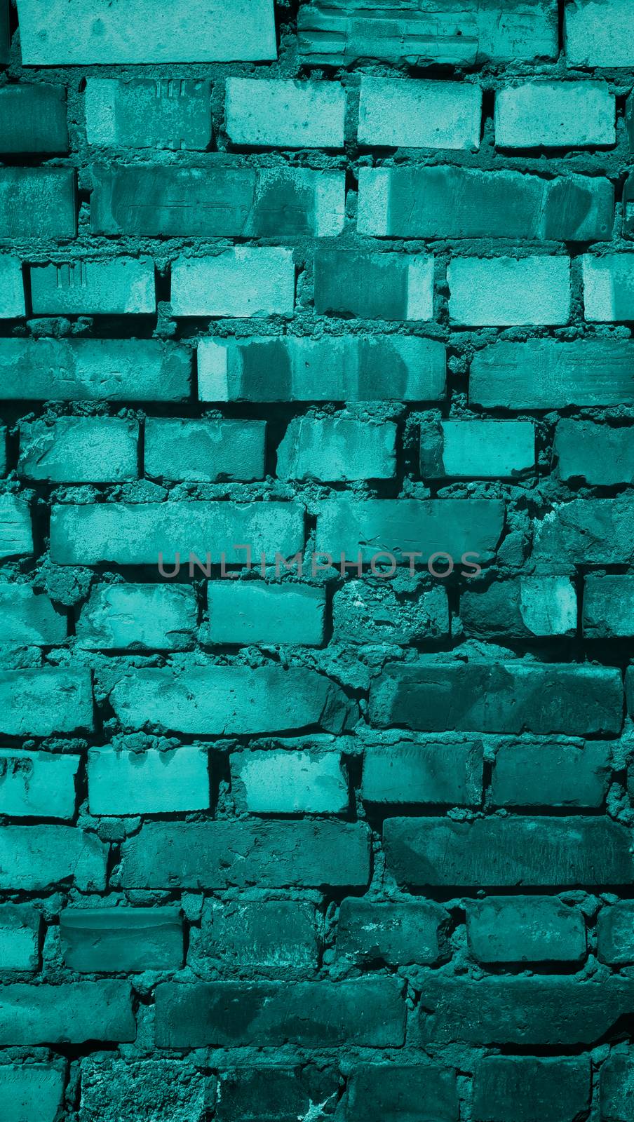 Background of Old Damaged Variegated Brick with Concrete Smoothing. Turquoise Toned