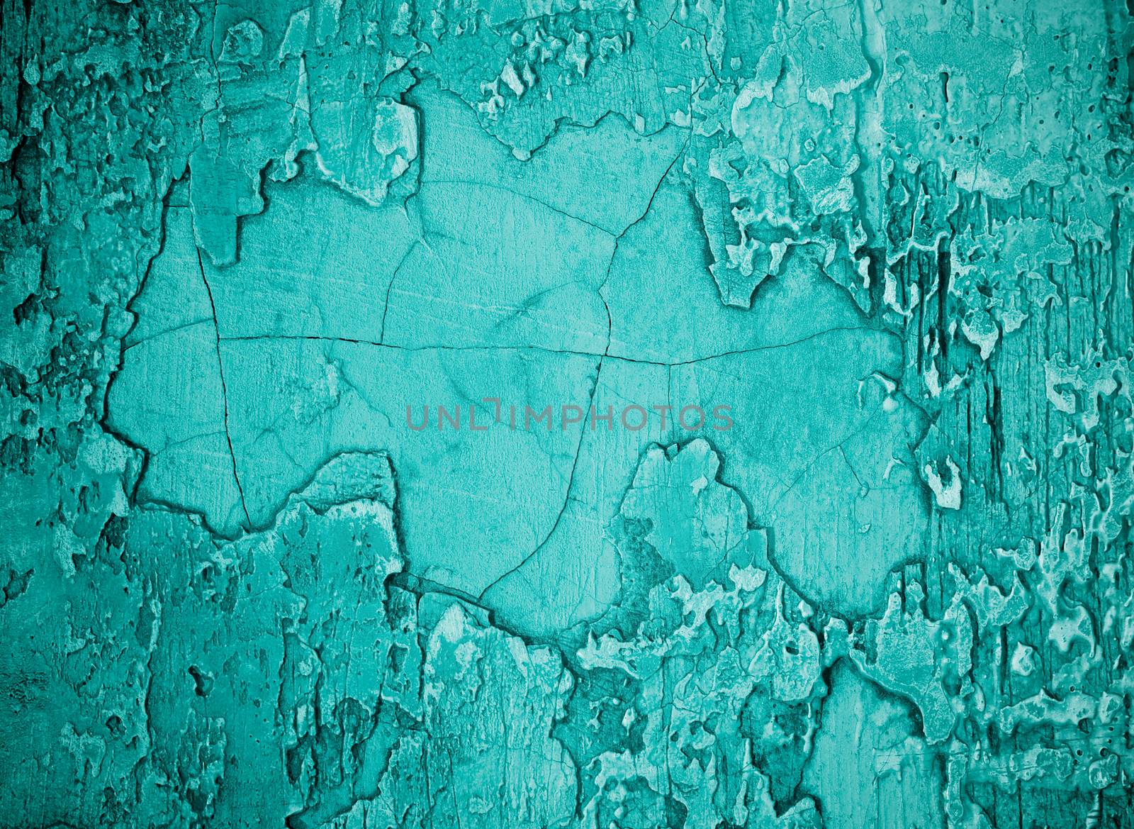 Turquoise Damaged Obsolete Cement Wall Background closeup 