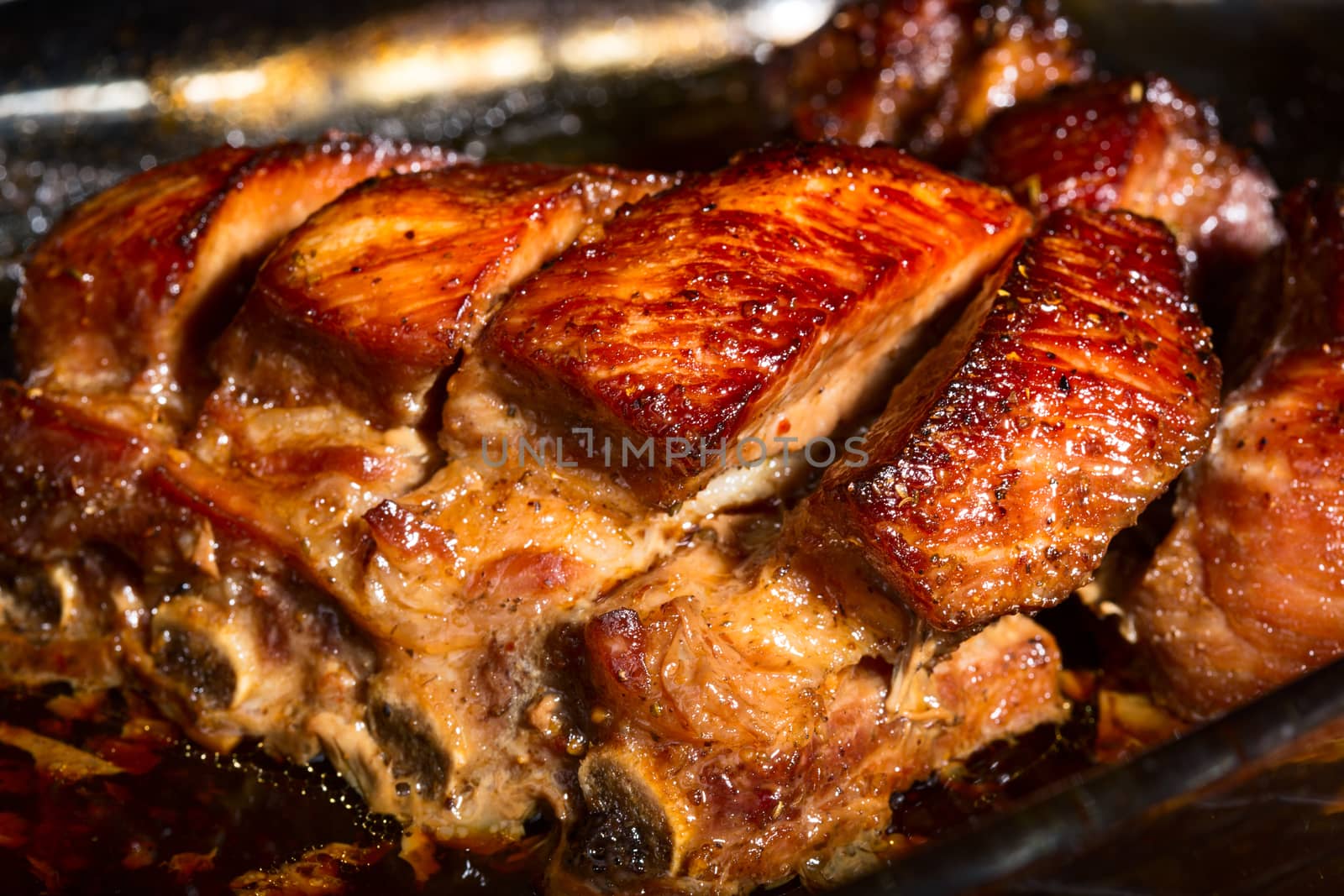 Close up view of a group of delicious cooked marinated ribs