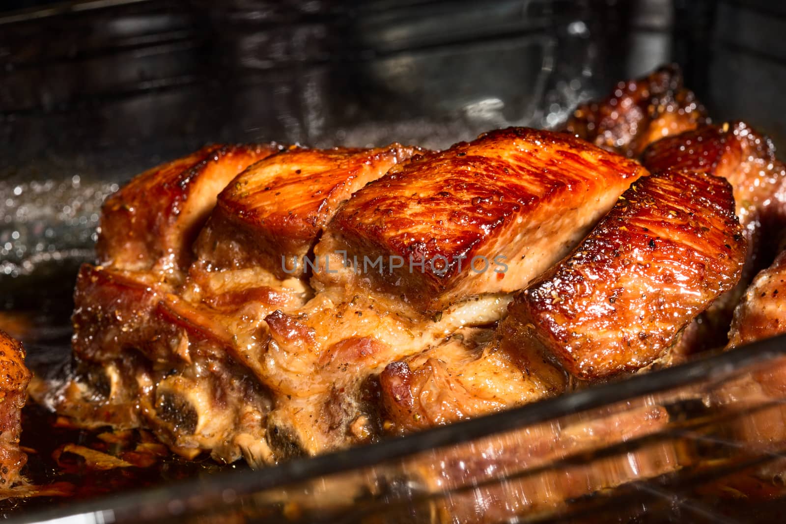 Close up view of a group of delicious cooked marinated ribs