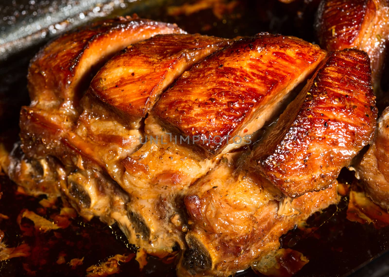 Close up view of a group of delicious cooked marinated ribs