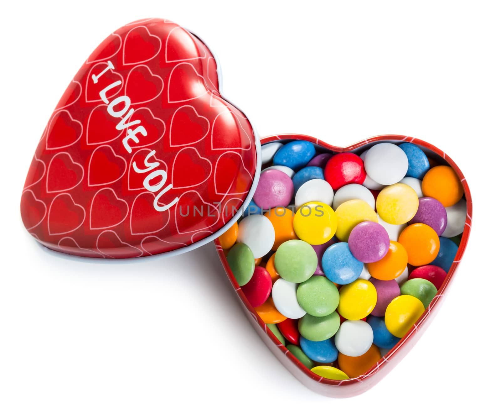 Heart shape box with colorful chocolate coated candy, isolated