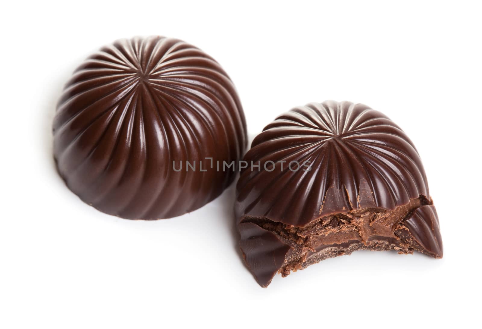 Two chocolate candies isolated on white background