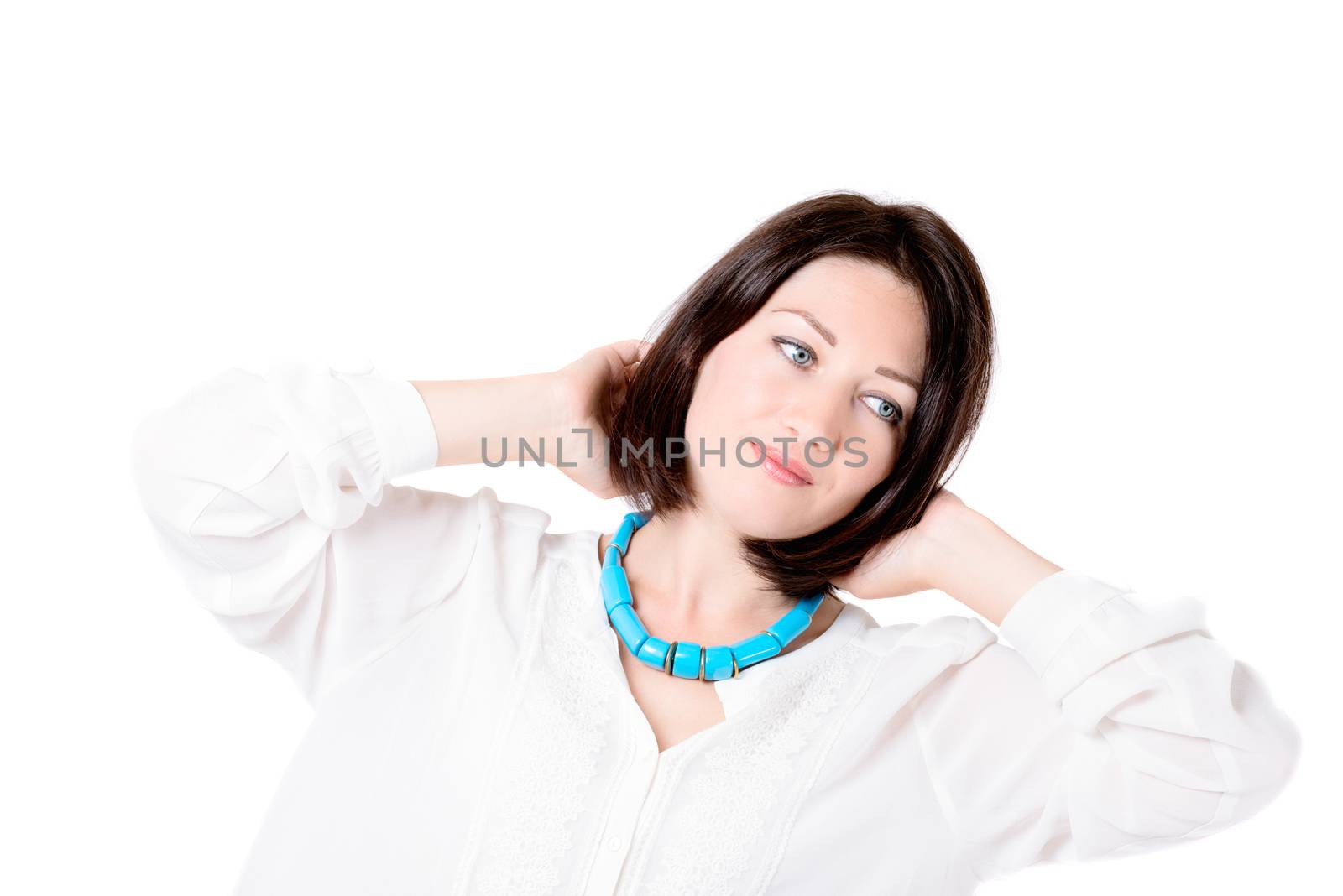 Beautiful brunette girl on white background in studio