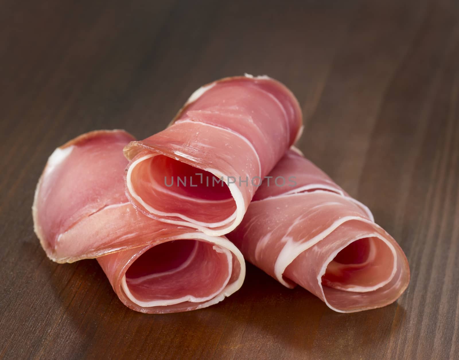  Ham rolls on wooden background
