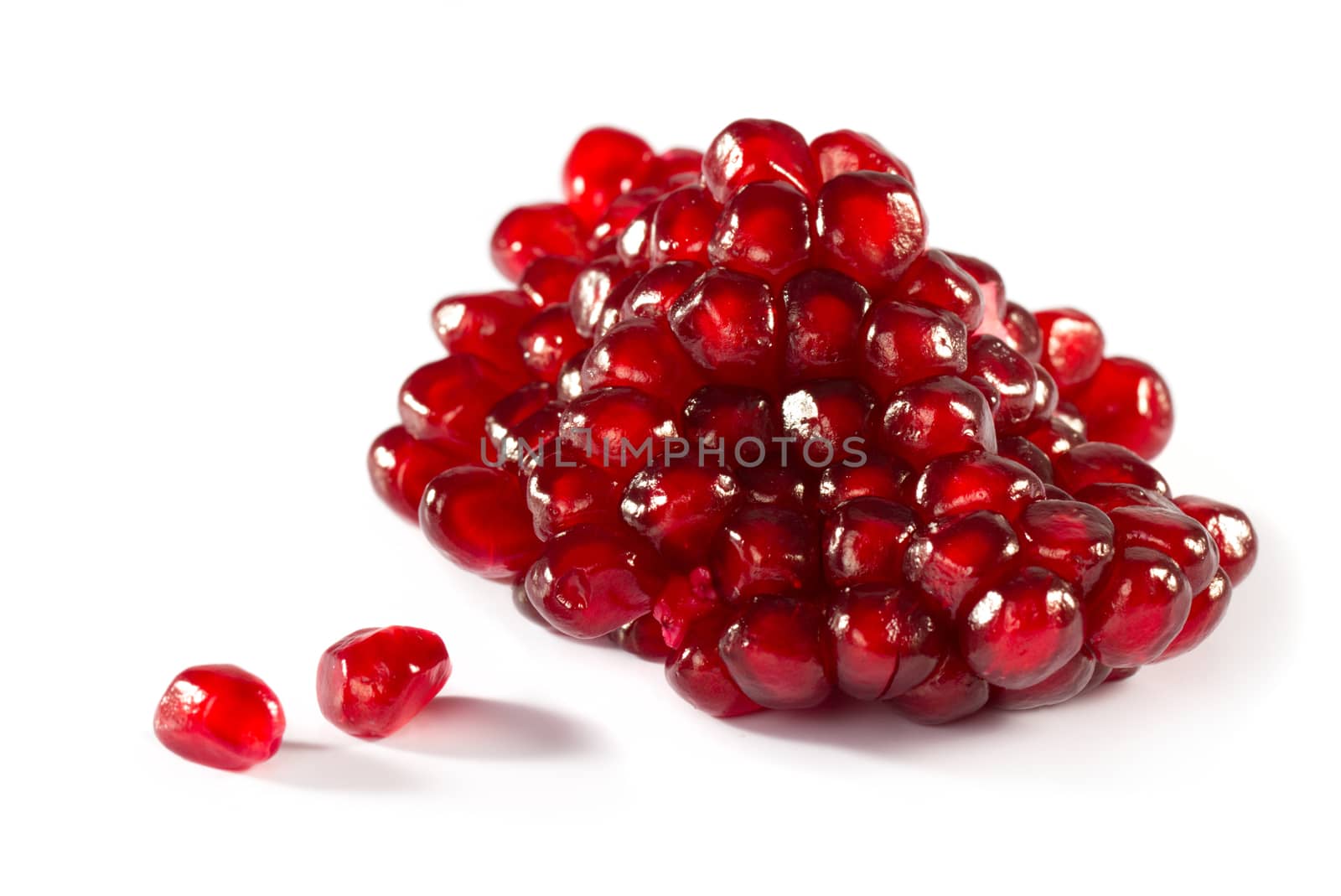 Ripe pomegranate piece isolated on white