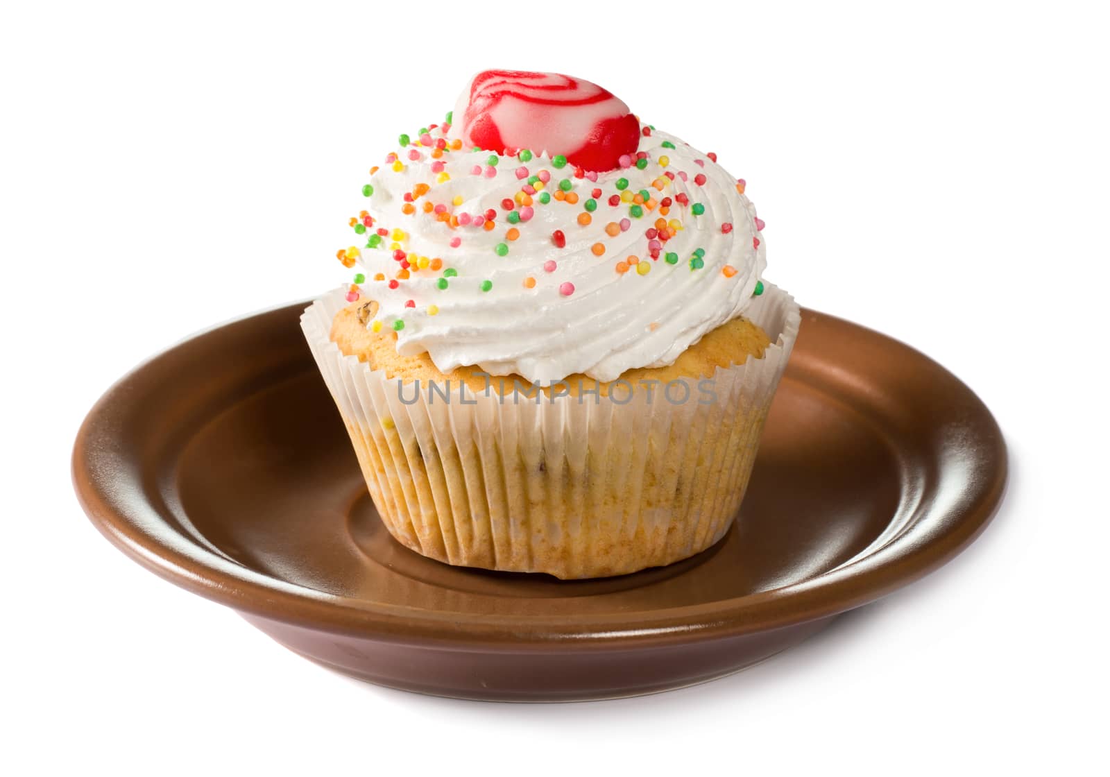 Cupcake on brown plate isolated on white